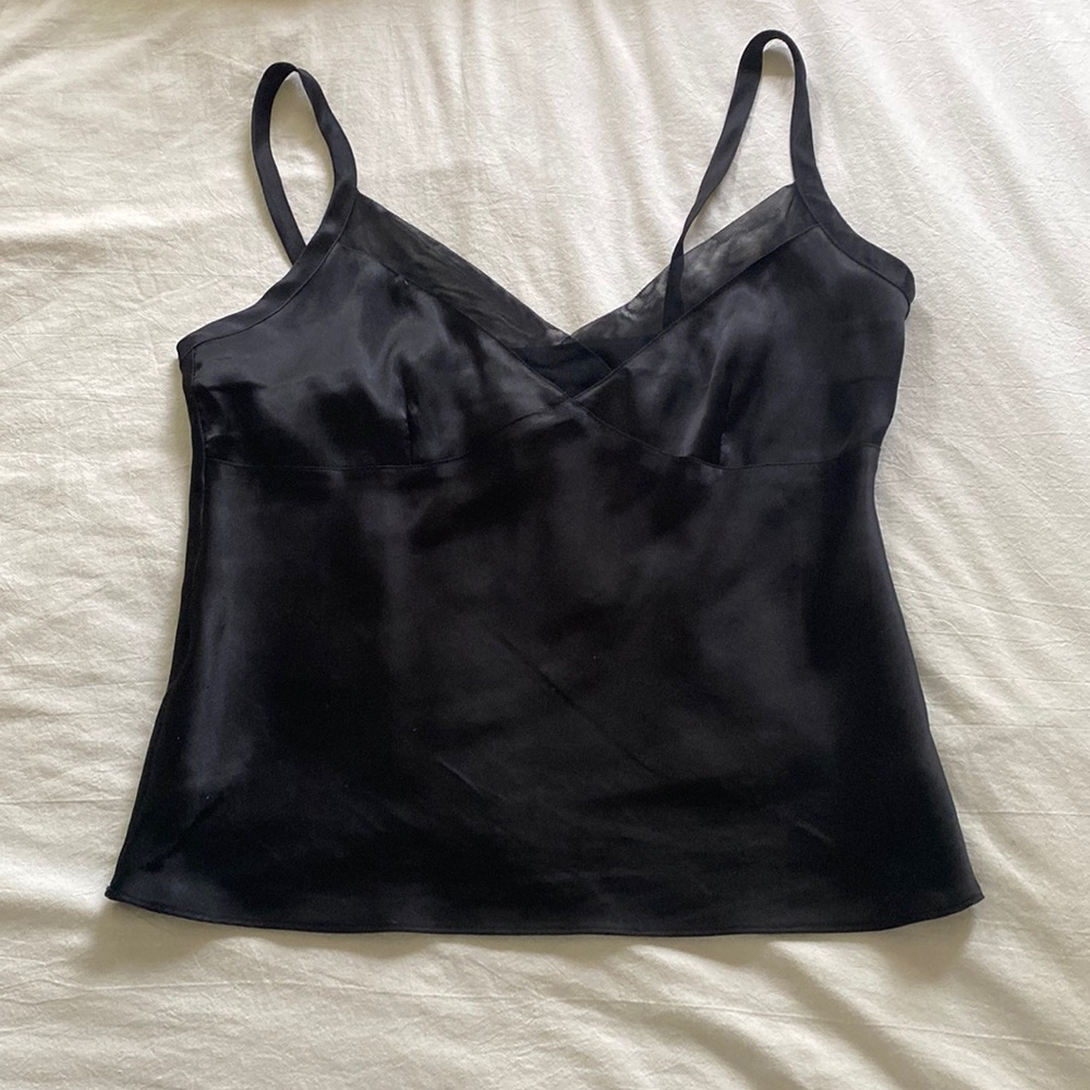 Black tank with sheer neckline. Super comfy and pretty material